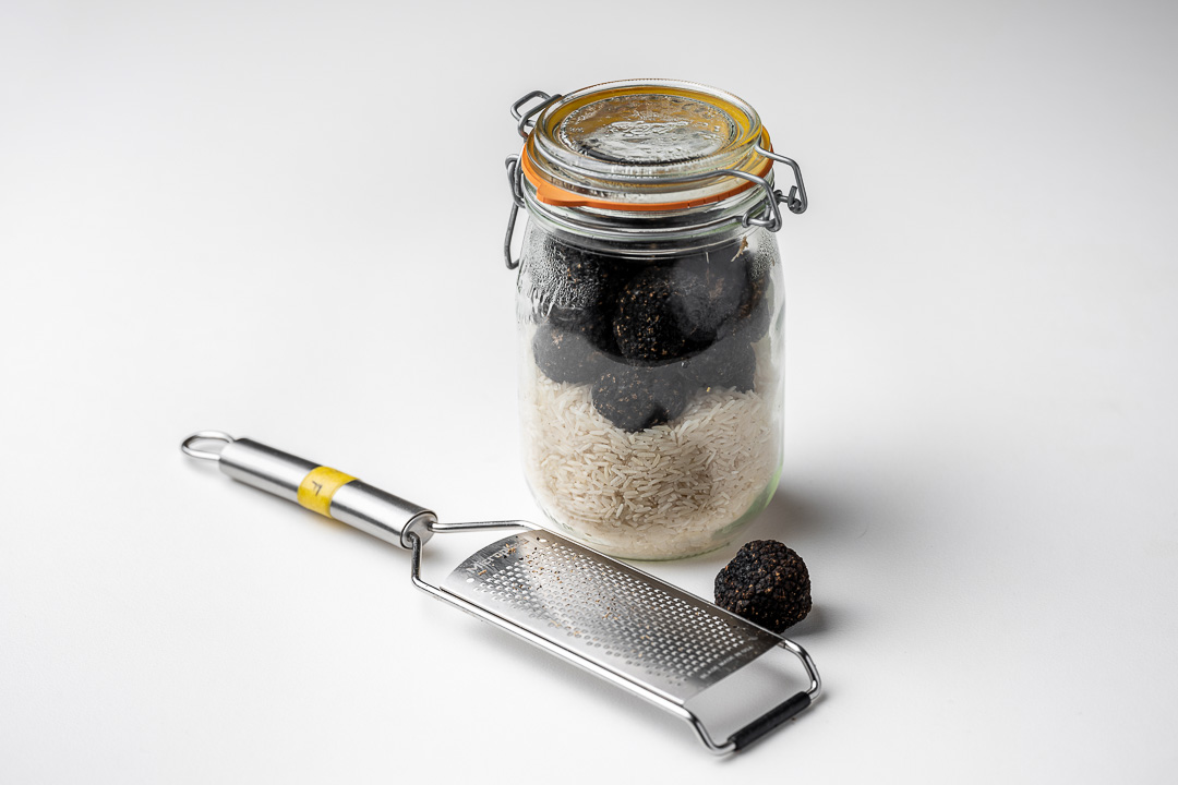 https://hungryformore.be/app/uploads/2024/12/kommilfoo-antwerp-jar-of-truffles-with-a-truffle-slicer.jpg