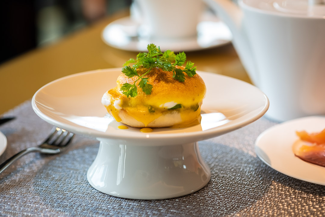 https://hungryformore.be/app/uploads/2024/12/sukhothai-bangkok-breakfast-dish-on-a-white-stand.jpg