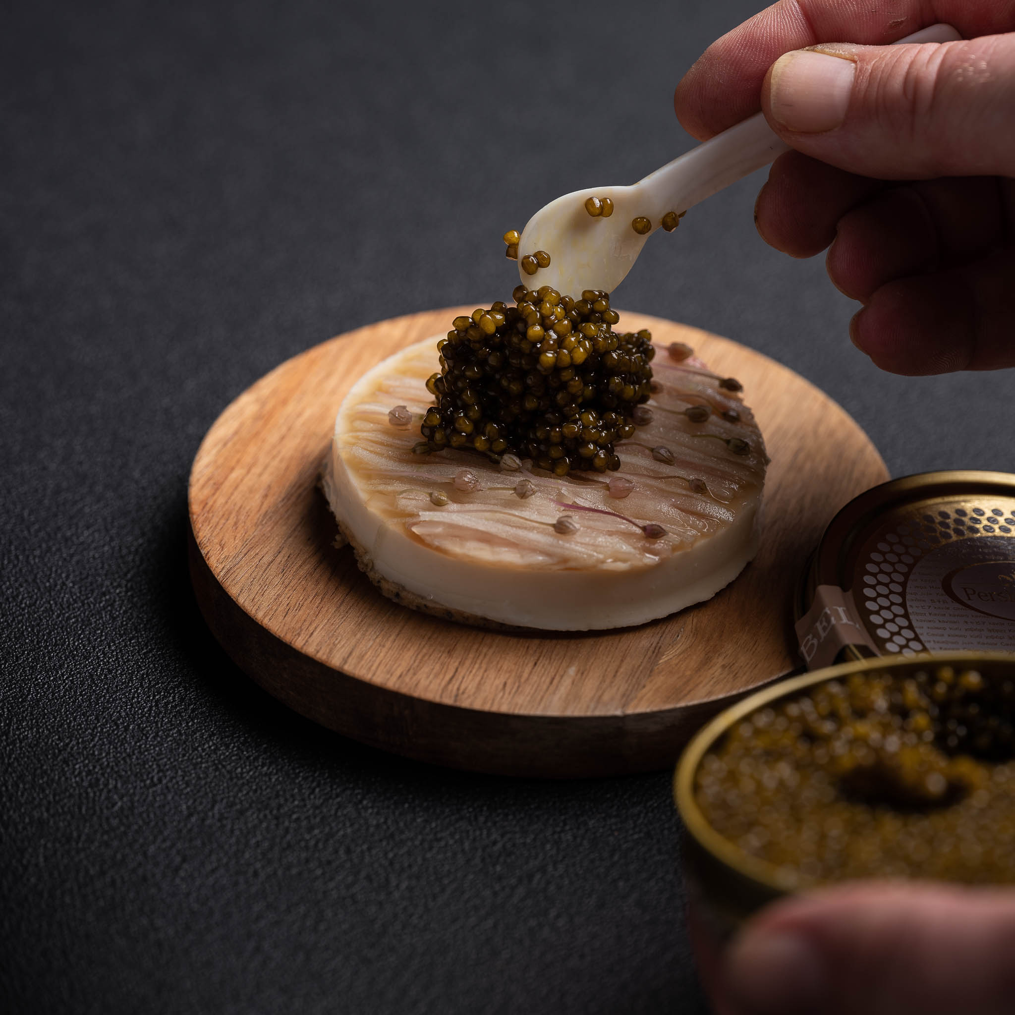 https://hungryformore.be/app/uploads/2025/01/pastorale-rumst-caviar-being-spooned-onto-a-dish.jpg