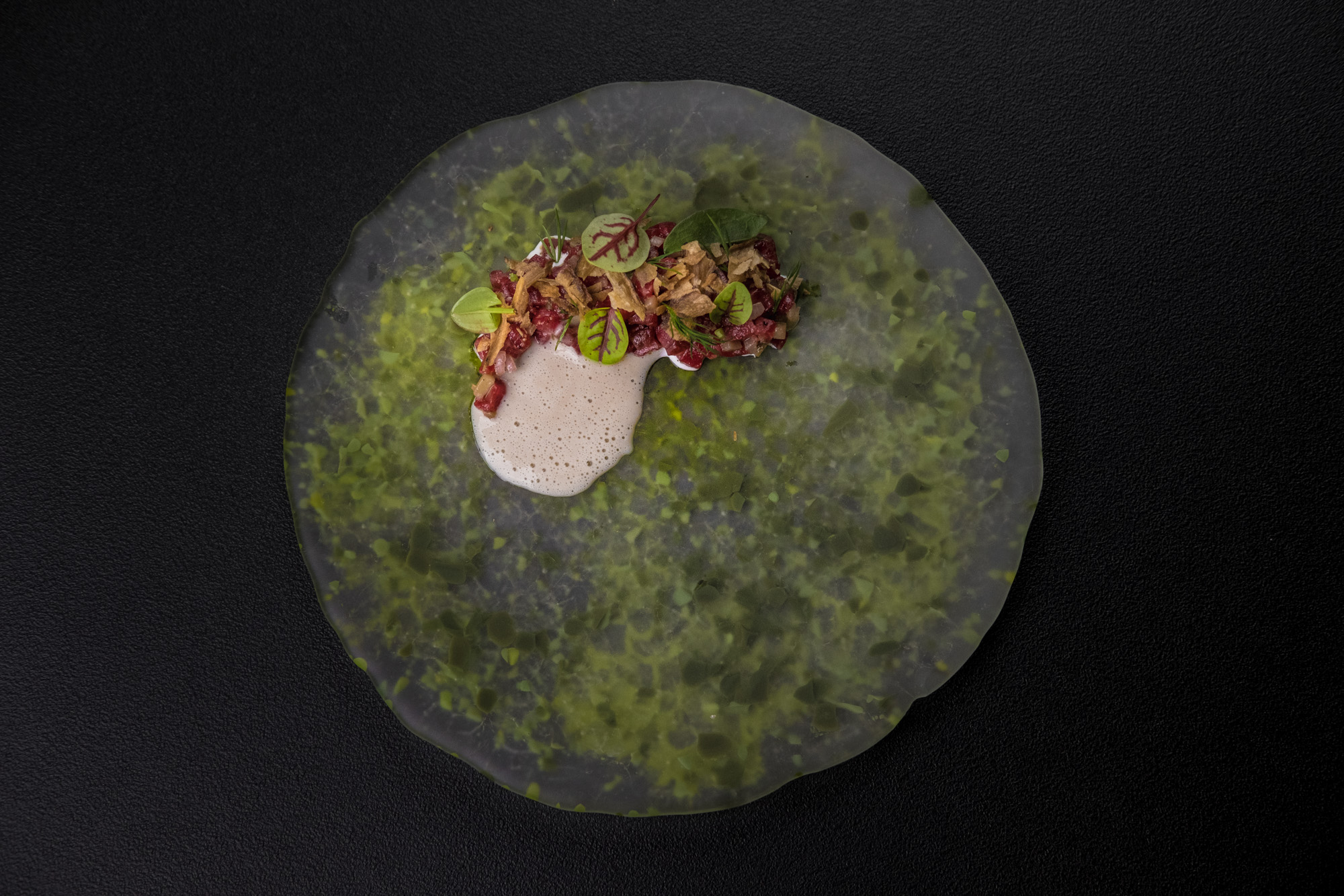 https://hungryformore.be/app/uploads/2025/01/pastorale-rumst-dish-on-a-green-speckled-plate.jpg