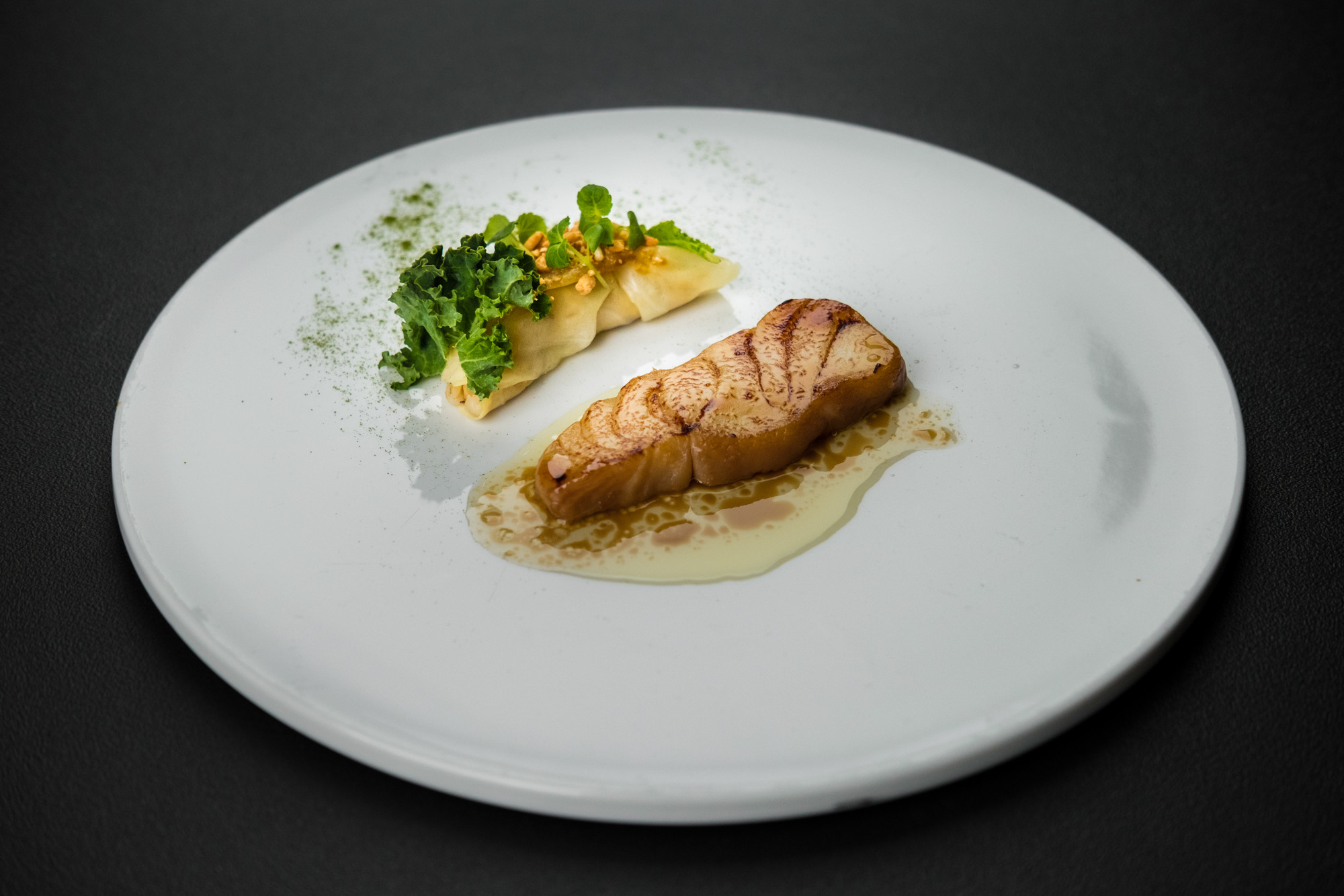 https://hungryformore.be/app/uploads/2025/01/pastorale-rumst-fish-with-greens-on-a-white-plate.jpg