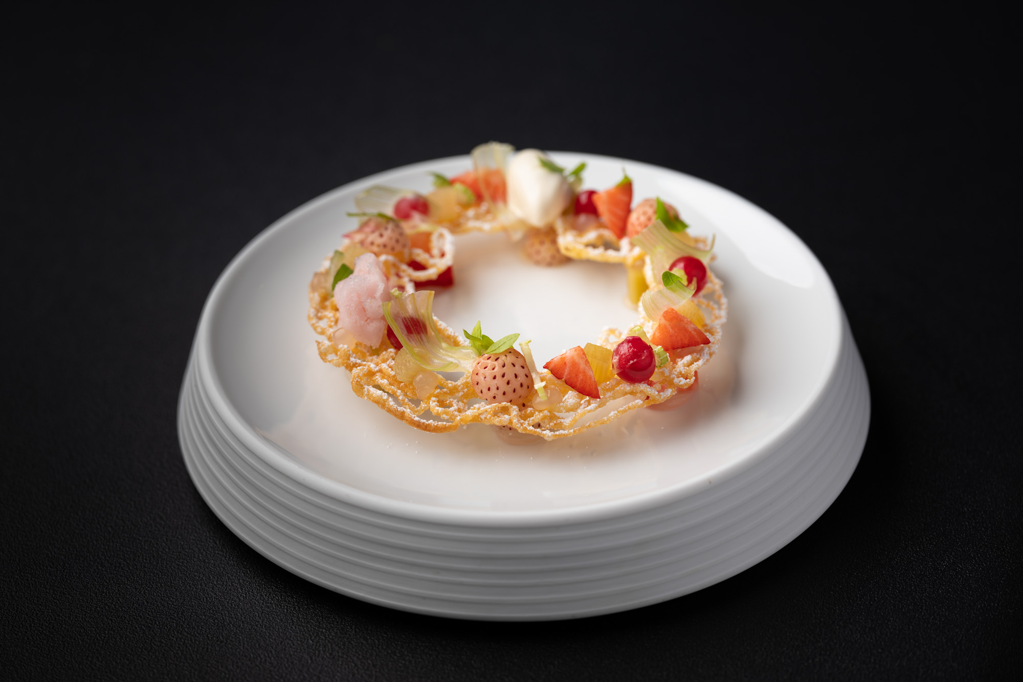 https://hungryformore.be/app/uploads/2025/01/pastorale-rumst-ring-shaped-dish-on-a-white-plate.jpg