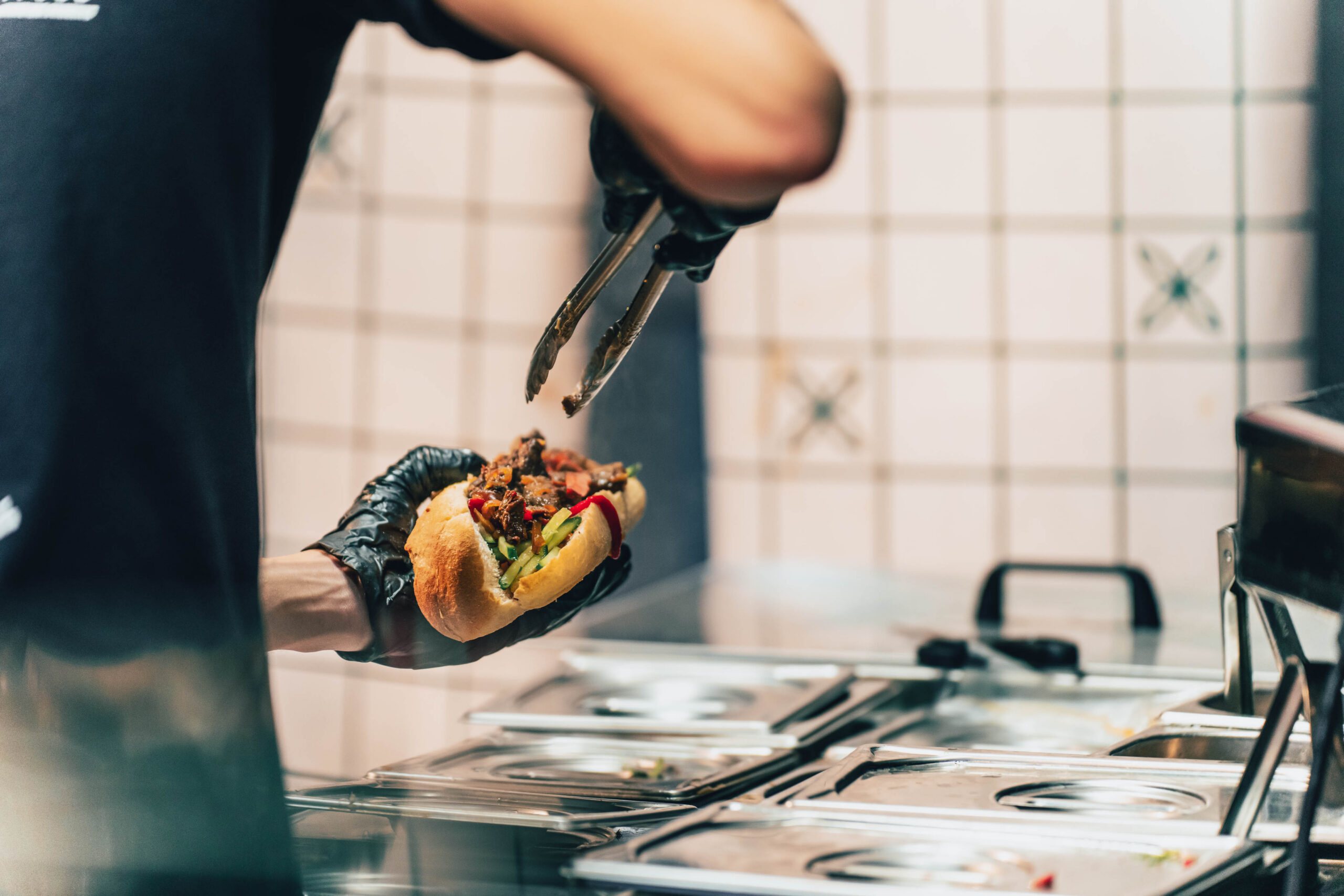 https://hungryformore.be/app/uploads/2026/10/banh-mi-express-grilled-meat-banh-mi-scaled.jpg