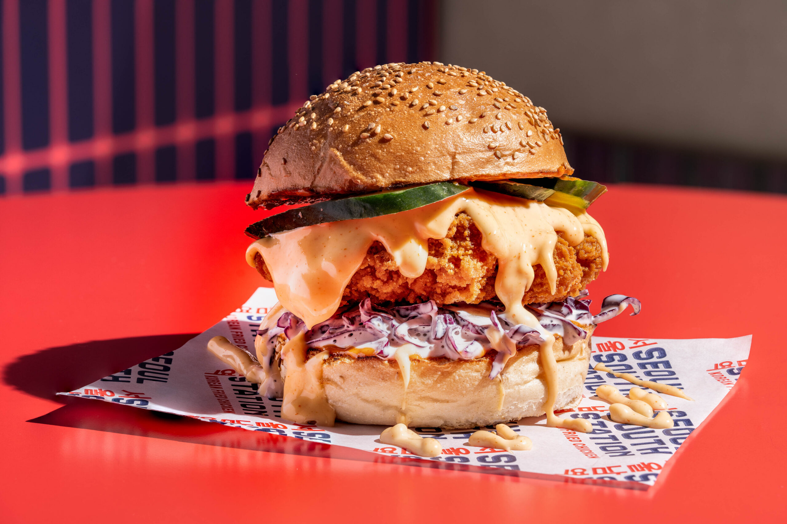 https://hungryformore.be/app/uploads/2026/10/seoul-south-station-korean-fried-chicken-burger-scaled.jpg